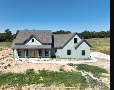 View of modern farmhouse style home