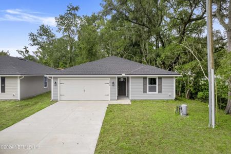 New construction Single-Family house 10812 Ogalla Avenue, Jacksonville, FL 32219 - photo 0