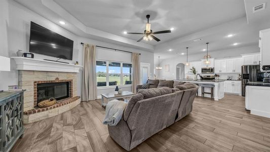 Living space featuring wood burning fireplace