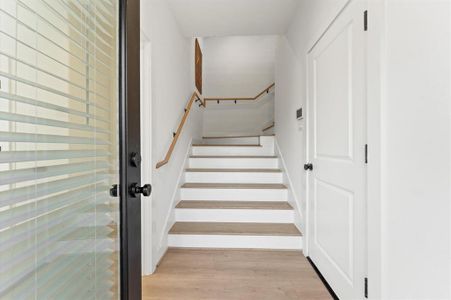As you enter the front door. (Photos are of the  model home floor plan A)