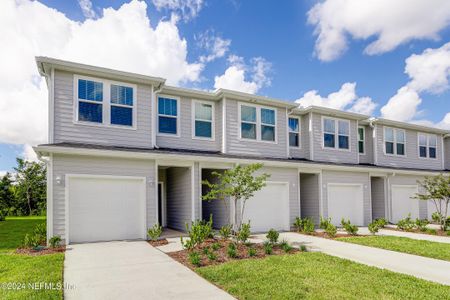 New construction Townhouse house 690 Holly Lakes Drive, Orange Park, FL 32073 - photo 0