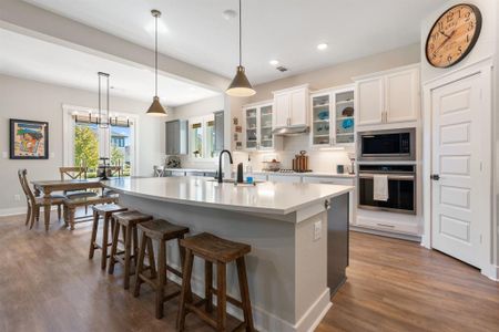 Massive island, upgraded Frigidaire Gallery appliance, 5 burner gas stove, and undercabinet lighting make this the perfect kitchen for entertaining.