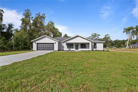 New construction Single-Family house 716 County Road 533, Sumterville, FL 33585 - photo 0