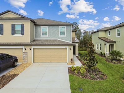 New construction Townhouse house 17775 Tawny Malt Place, Land O' Lakes, FL 34638 - photo 0