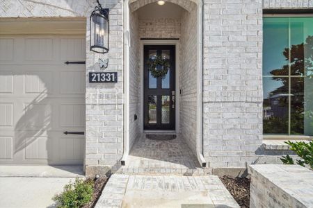 Inviting covered entry with upgraded front door