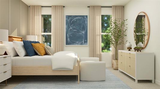 Bedroom featuring light colored carpet