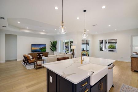 Open concept to kitchen with large counter island seating