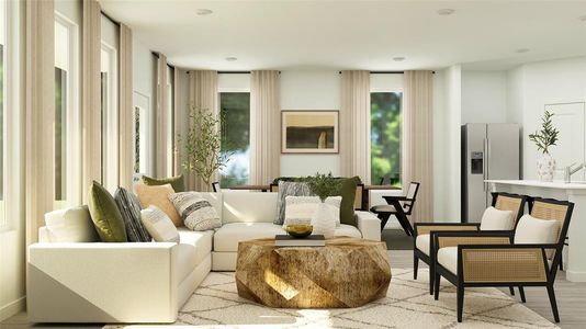 Living area with light hardwood / wood-style floors and plenty of natural light