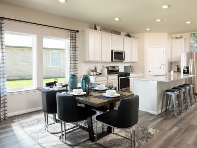 A combined kitchen and dining area make entertaining a breeze.