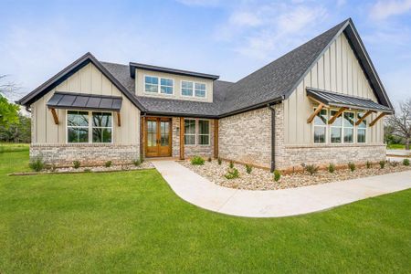 View of front of property with a front lawn