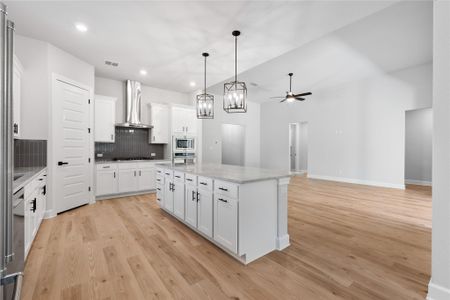 The Leland kitchen includes an expansive center island for extra meal prep and cooking space.