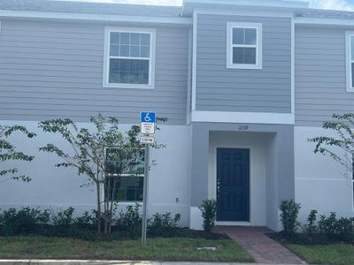 New construction Townhouse house 1239 Sand Torch Circle, Davenport, FL 33837 - photo 0