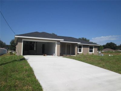 New construction Single-Family house 566 E Sequoia Place, Citrus Springs, FL 34434 - photo 1 1