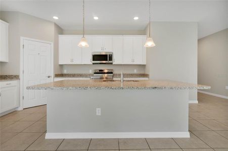 New construction Single-Family house 1060 Patriot Loop, Haines City, FL 33844 - photo 3