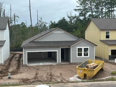 New construction Single-Family house 14712 Macadamia Lane, Unit 28, Jacksonville, FL 32218 Charleston- photo 0