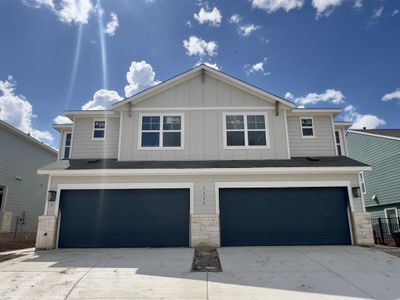 New construction Townhouse house 7324A Sparkling Light Dr, Del Valle, TX 78617 Acadia- photo 0 0