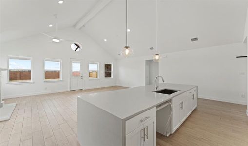 Open kitchen and living area in our Santa Rosa home design: Loft Palette 3. (*Photo not of actual home and used for illustration purposes only.)