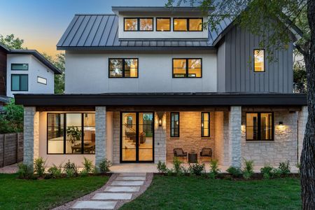 A beautiful facade with natural materials and a neutral palette perfectly compliments this choice location.