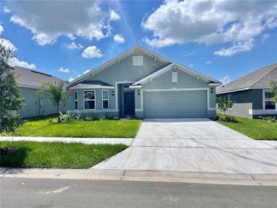 New construction Single-Family house 514 Tanaro Lane, Haines City, FL 33844 - photo 0