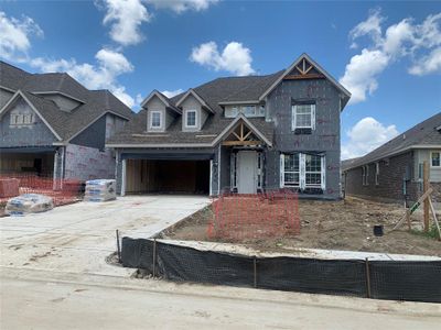 Two-story home with 4 bedrooms, 3.5 baths and 2 car garage.