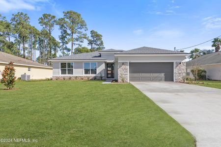 New construction Single-Family house 84 Barrington Drive, Palm Coast, FL 32137 Heron- photo 0