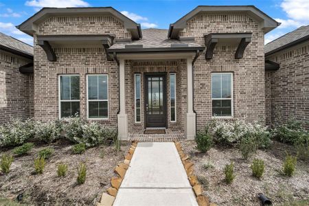 Beautiful elevation with upgraded rain glass front door