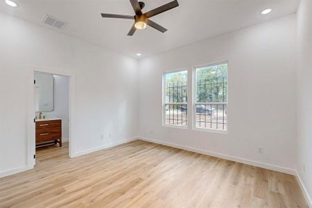 Unfurnished bedroom featuring light wood-type flooring and ceiling fan