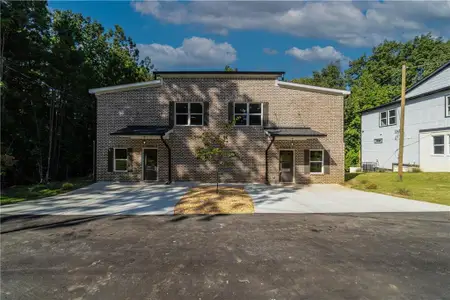 New construction Townhouse house 2393 Highpoint Road, Snellville, GA 30078 - photo 0