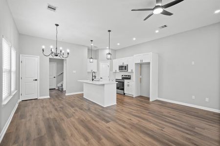 Plenty of natural light and lighting throughout this home. Featuring modern light fixtures and recessed lighting.