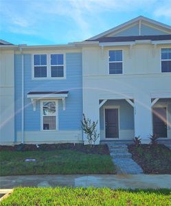 New construction Townhouse house 1268 Blue Island Drive, Clermont, FL 34714 - photo 0