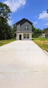 New construction Single-Family house 705 Little River Drive, Montgomery, TX 77316 - photo 0