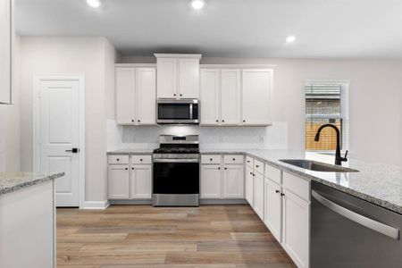 The kitchen with upgraded Whirlpool kitchen appliances.