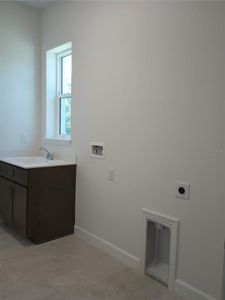 New construction Single-Family house 124 New Leatherwood Drive, Palm Coast, FL 32137 - photo 12 12