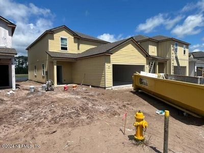 New construction Single-Family house 14750 Macadamia Lane, Unit 84, Jacksonville, FL 32218 - photo 1 1