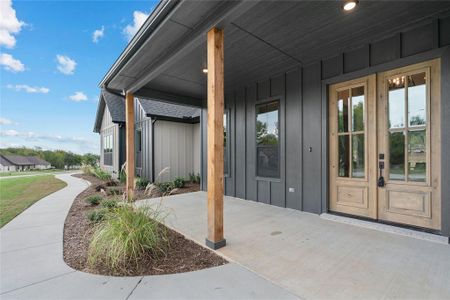 View of patio featuring french doors