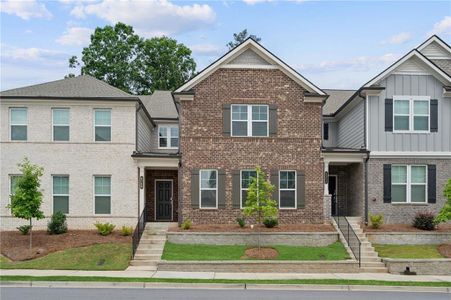 New construction Townhouse house 4240 Tifton Lane, Sugar Hill, GA 30518 - photo 0