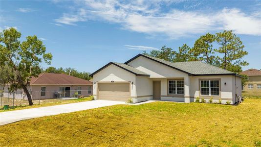 New construction Single-Family house 1904 Escambia Ln, Poinciana, FL 34759 - photo 1 1