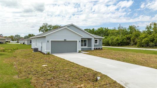 New construction Single-Family house 1500 Lake Wales Place, Poinciana, FL 34759 - photo 1 1