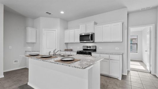 Kitchen- All Home and community information, including pricing, included features, terms, availability and amenities, are subject to change at any time without notice or obligation. All Drawings, pictures, photographs, video, square footages, floor plans, elevations, features, colors and sizes are approximate for illustration purposes only and will vary from the homes as built.