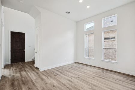 Spare room featuring light hardwood / wood-style flooring