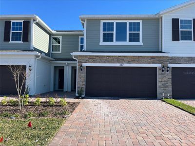 New construction Townhouse house 1187 Woody Cypress Drive, Kissimmee, FL 34746 Powell- photo 0