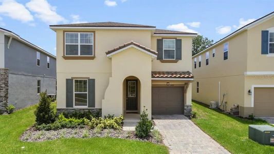 New construction Single-Family house 1999 Tropical Palms Circle, Kissimmee, FL 34747 - photo 0 0