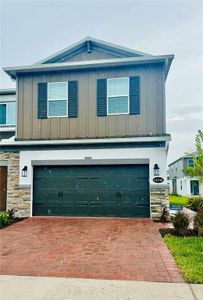 New construction Townhouse house 14738 Outfitter Street, Orlando, FL 32824 - photo 0