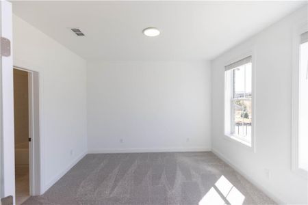 Terrace level bedroom*Photo of model home in a different community. Used for illustrative purposes only*