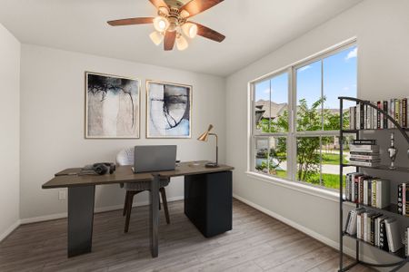 Quietly nestled in the front of the home, the study is a perfect place for a home office featuring gorgeous flooring, French doors and large windows.