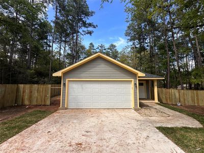 New construction Single-Family house 7984 Coral Bean Drive, Plantersville, TX 77363 - photo 0 0