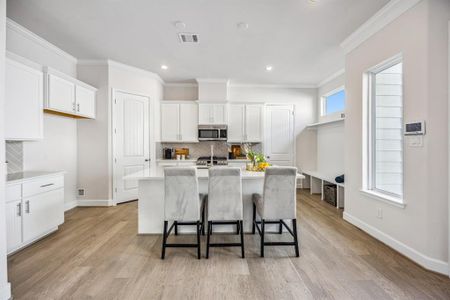 Gourmet dreams come to life in the updated Chesapeake Kitchen, your canvas for culinary mastery, complete with luxe quartz and custom cabinetry.