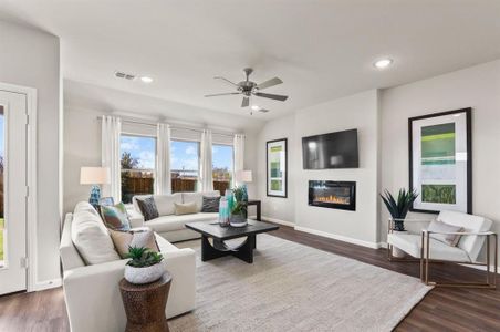 Living room in the Heisman home plan by Trophy Signature Homes – REPRESENTATIVE PHOTO