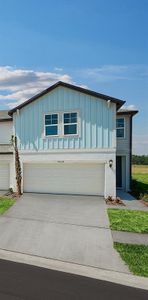 New construction Townhouse house 7639 Momentum Parkway, Wesley Chapel, FL 33545 - photo 0