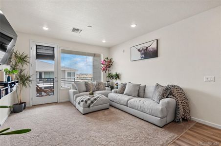 Entertain with this open kitchen and living room layout.